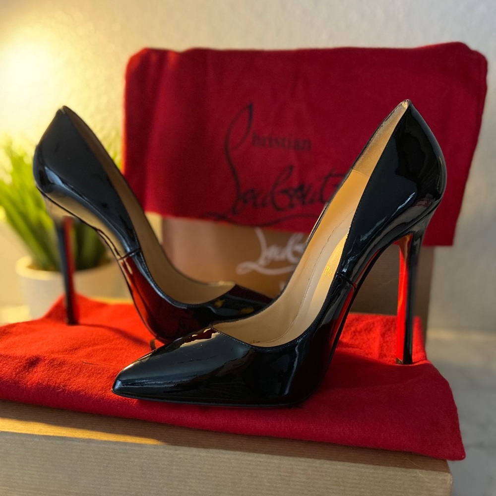 Christian Louboutin *NEVER WORN* Red Bottoms